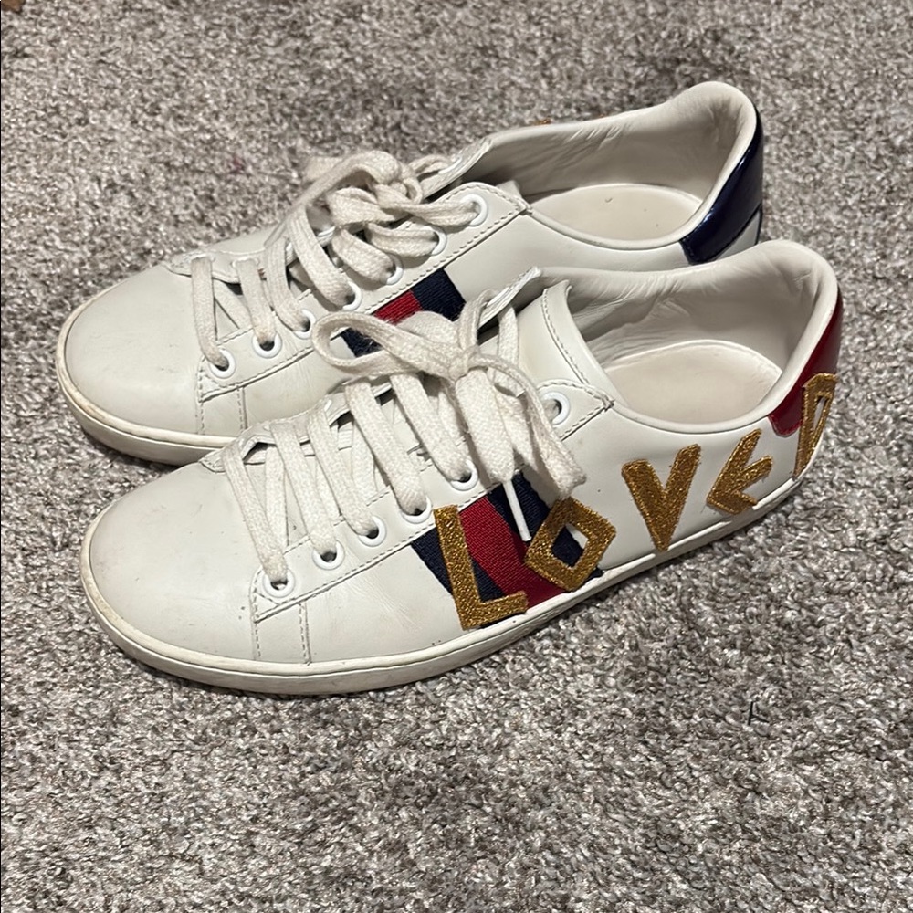 Gucci White Sneakers with Gold Accents